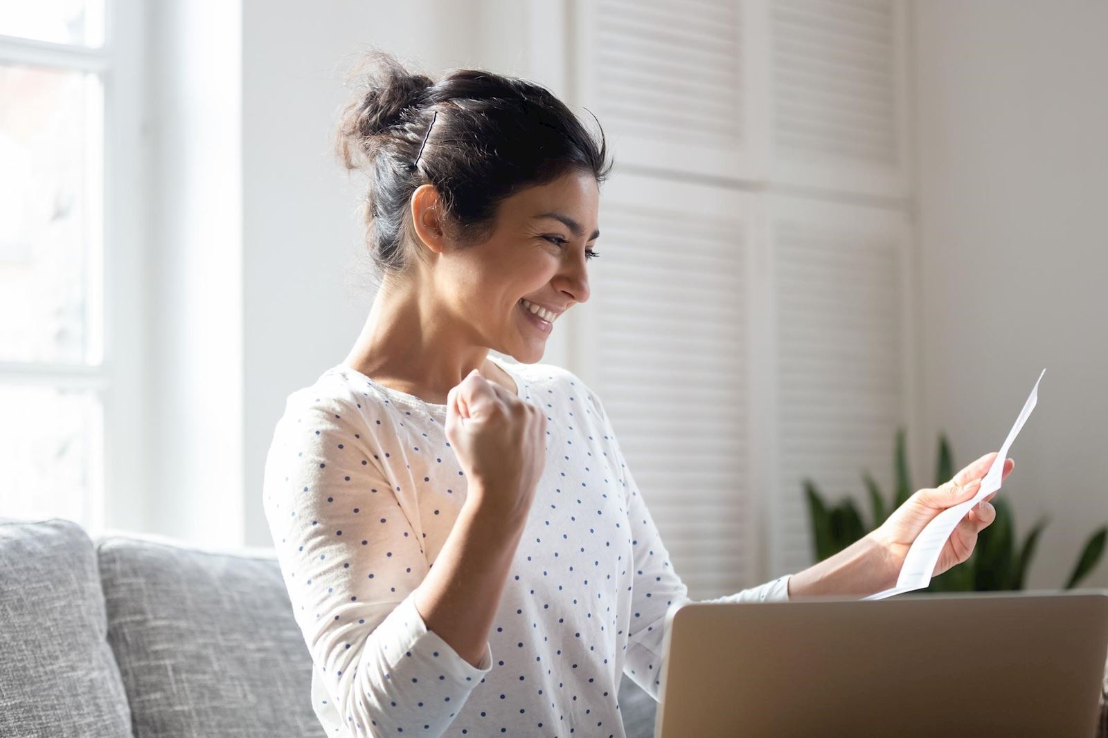 Woman reading mammogram test results