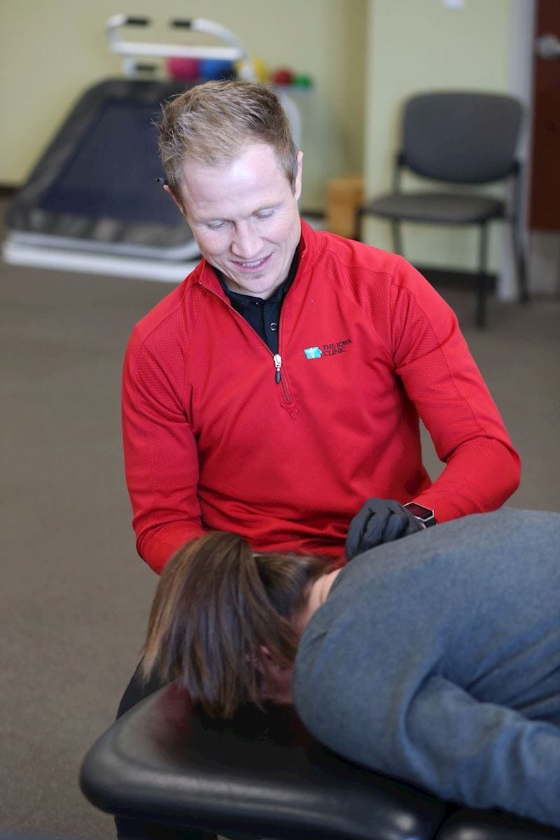 Tony Moore dry needling a patient