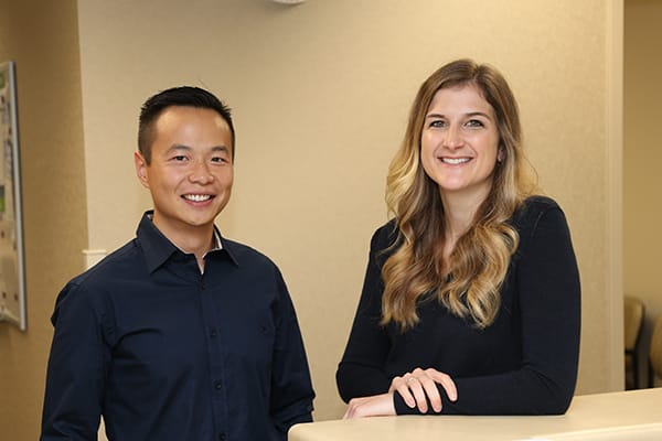 Pain Management  Doctors standing and smiling