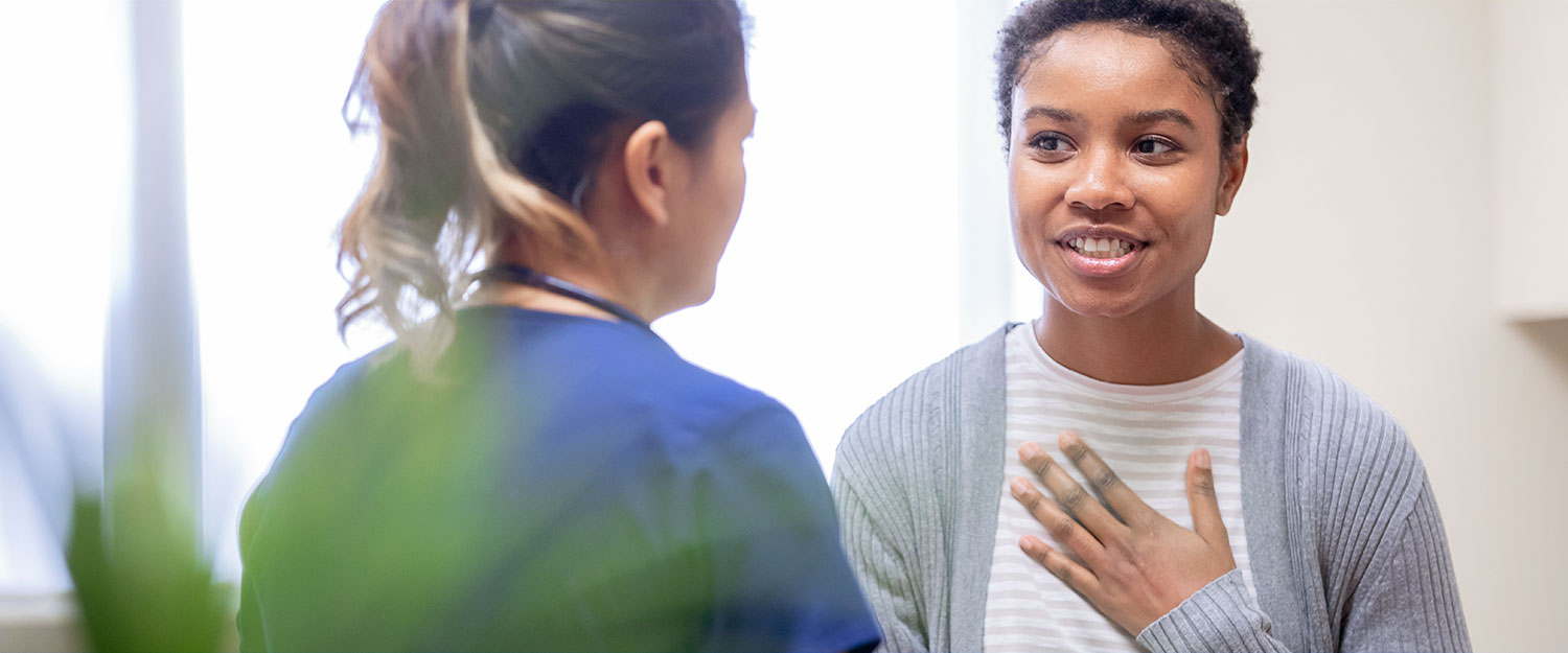 Woman talking to a doctor