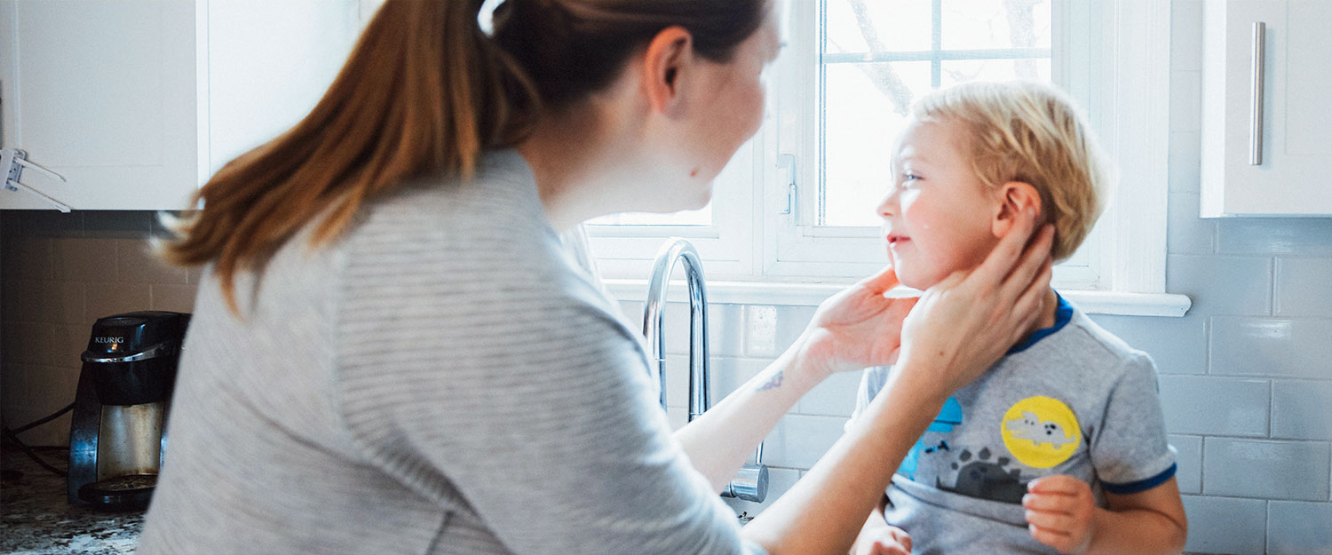 Doctor examining child