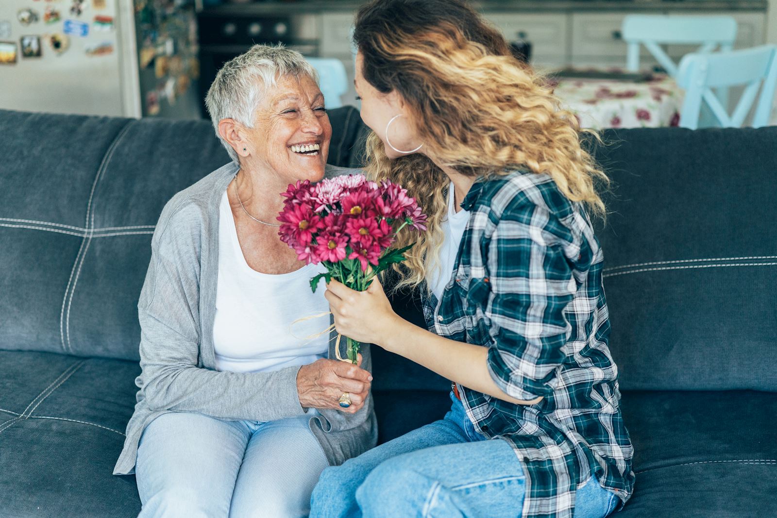 family holding flowers