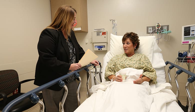 Endoscopy Center - post procedure; doctor speaking with patient