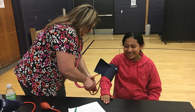 blood pressure check on young female